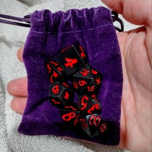 metal d&d dice an purple velvet bag